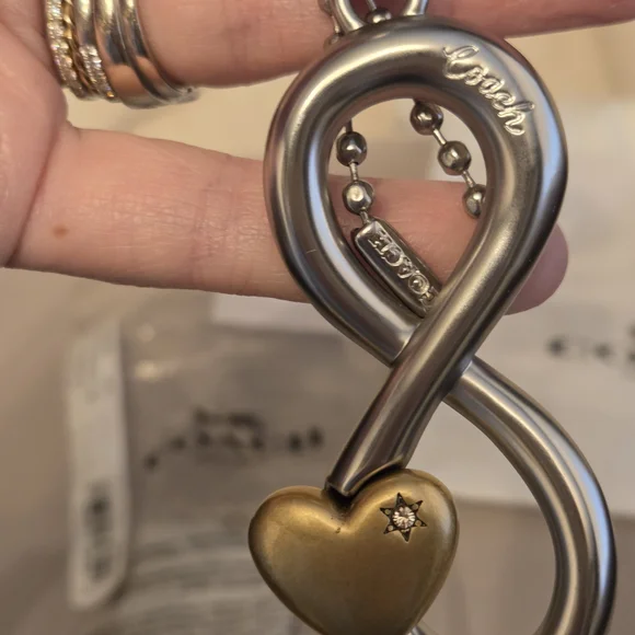 Coach | The Summer I Turned Pretty | Infinity Silver and Gold Keychain Bag Charm - Picture 4 of 16